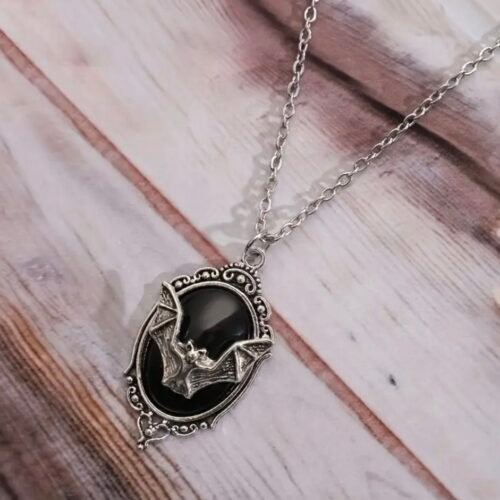 oval black bat necklace