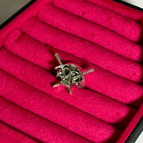 swords skull head ring