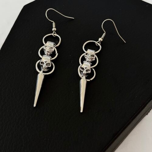 one spike skeletons earrings