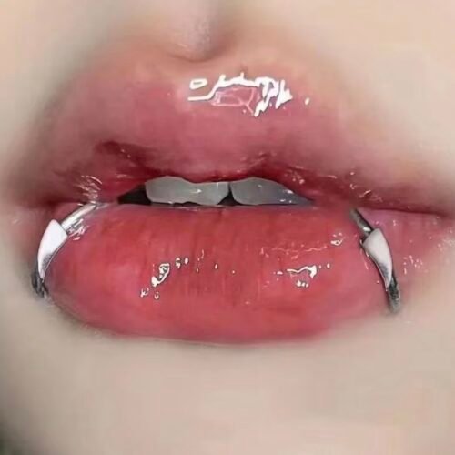 2 vampire fangs fake piercings